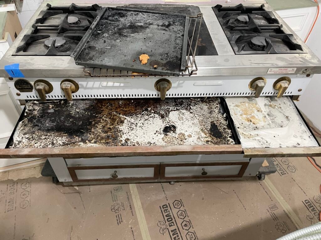 Ultra-luxury La Cornue range in near disastrous condition, tarnished brass and worn surfaces needing full restoration and repair