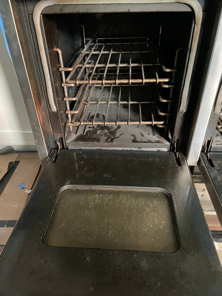 Side‑by‑side comparison of a Wolf cooking range in NYC before and after OvenPal’s professional deep cleaning, showing significant buld up of grease, grime, and residue before our professional cleaning