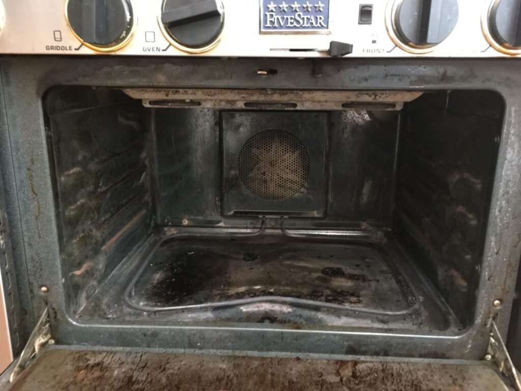 Side‑by‑side comparison of a Five Star Electirc Cooking Range professional deep cleaning by OvenPal, showing grease, grime, and residue accumulated all over oven cavity before cleaning