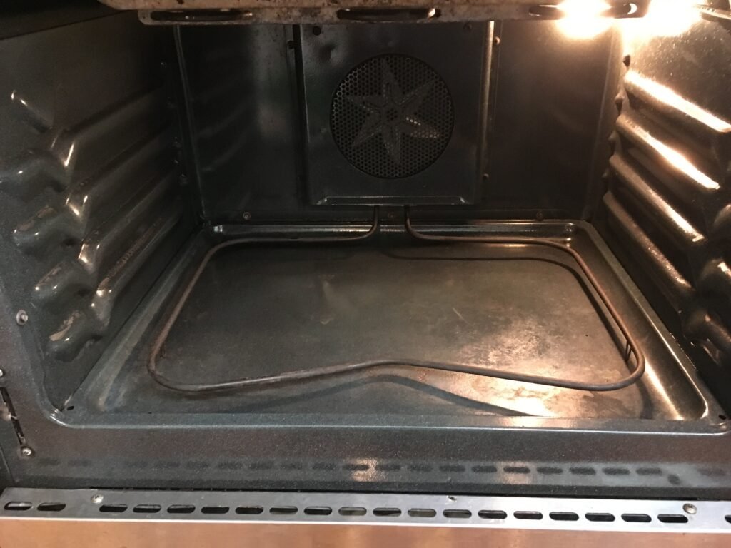 Side‑by‑side comparison of a Five Star Electirc Cooking Range professional deep cleaning by OvenPal, showing grease, grime, and residue complete removal
