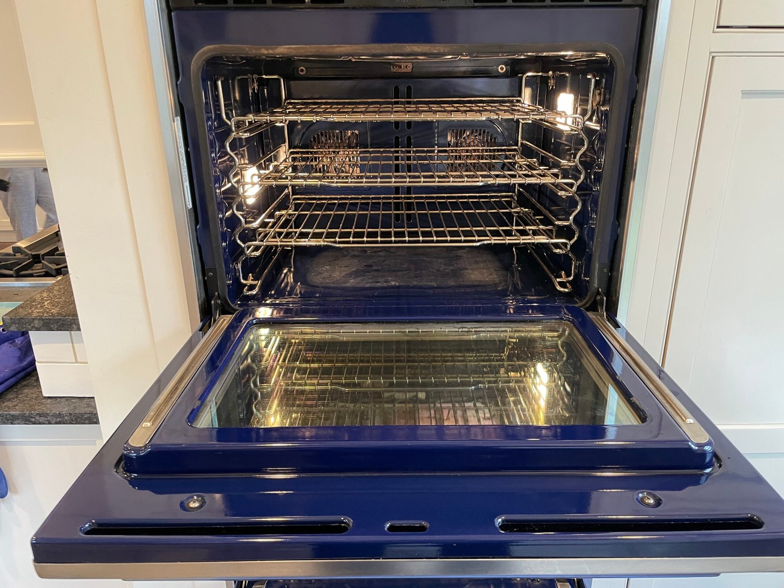 Thermador oven after deep cleaning — stainless steel interior polished, racks restored, spotless finish