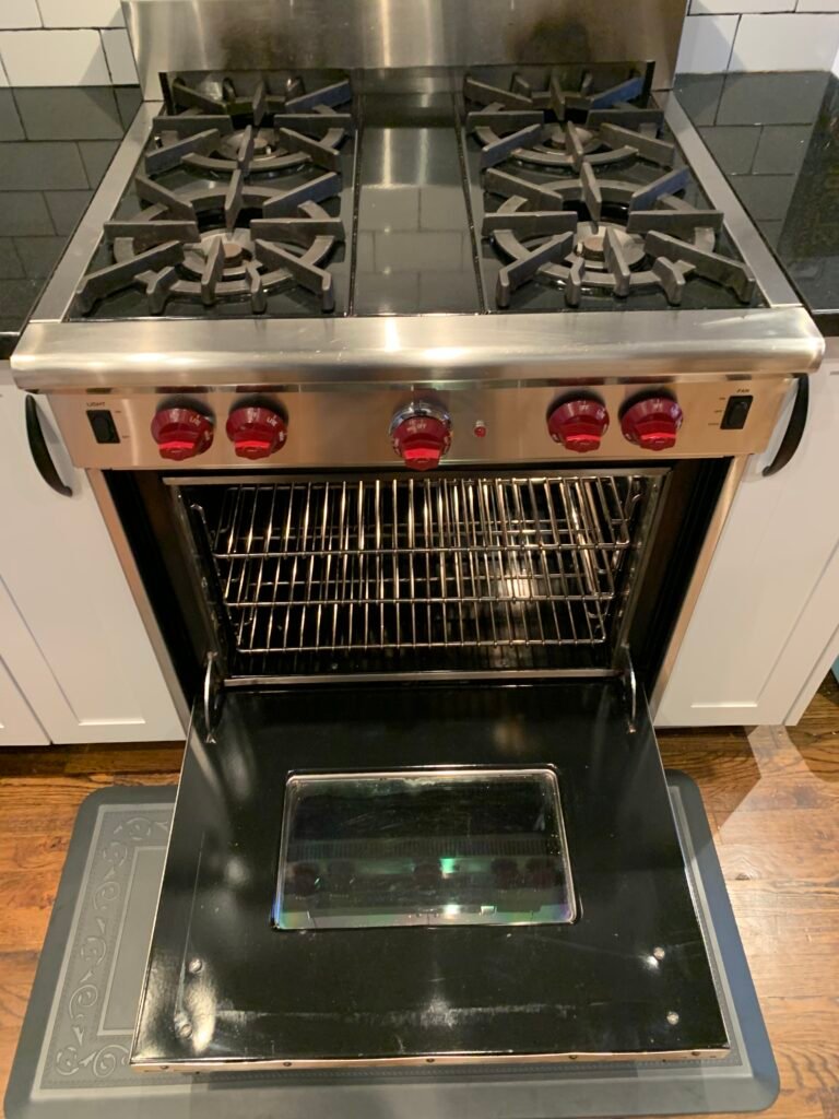 Spotless Wolf gas range after professional deep cleaning and luxury detailing service.