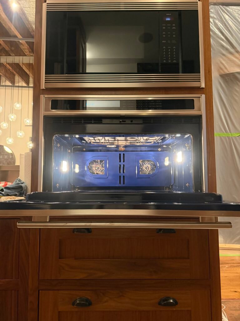 Built‑in electric Wolf oven after expert deep cleaning in NYC, spotless and sparkling like new.