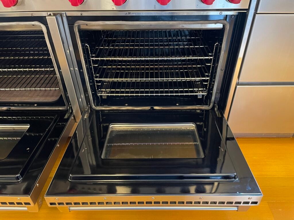    Following a full door disassembly, deep carbon removal, and precision glass brightening, the Wolf door was restored to a clear, polished, showroom‑level finish. Stainless‑steel surfaces were hand‑detailed, hinges and seals cleaned for smoother operation, and the door reassembled to perform like new — a true Manhattan chef‑grade reset.