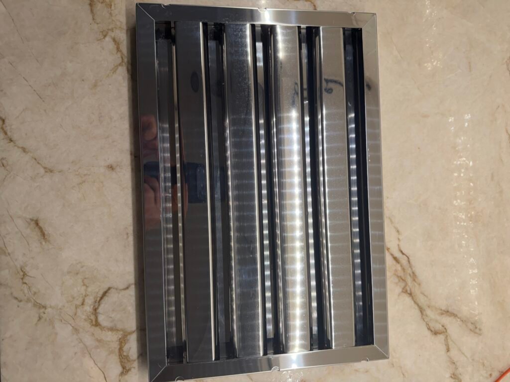 IMG_0773_2 Viking Hood Baffles deep degreasing and restoration of stainless‑steel Viking hood baffles, removing heavy grease saturation and airflow‑blocking residue to restore proper ventilation performance and a crisp, polished finish.